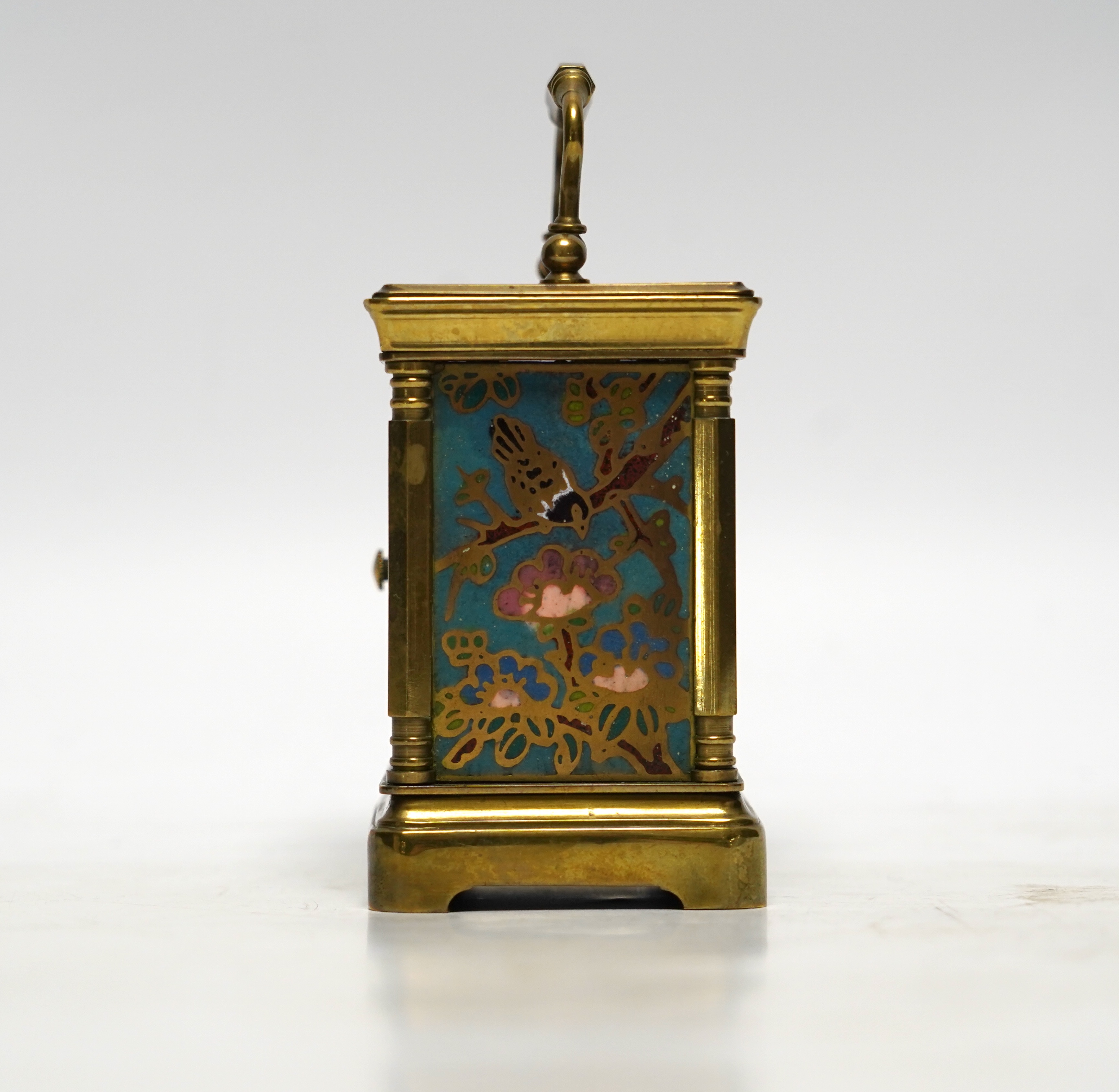 A miniature French brass carriage clock, with champlevé enamel panels, face signed Elliott & Son, London, 8.5cm